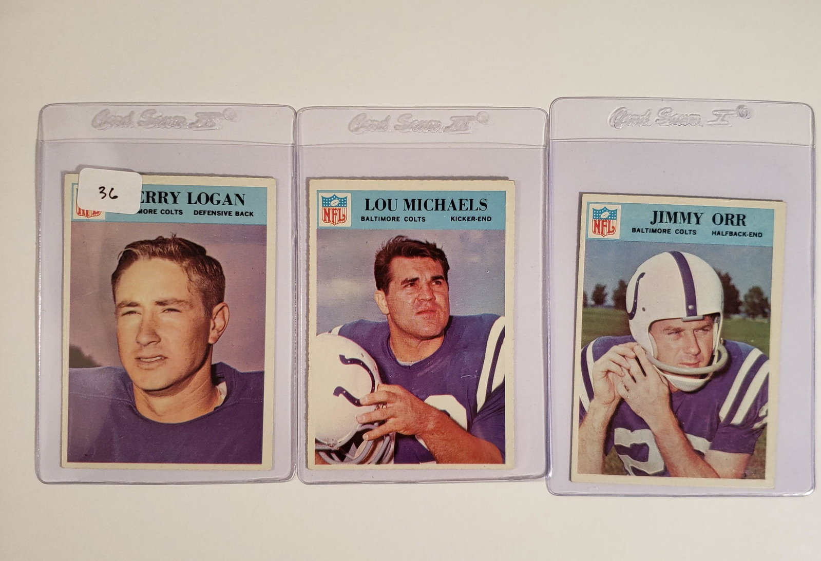 LOT OF 3 VINTAGE BALTIMORE COLTS FOOTBALL CARDS: 1966 Philadelphia #17 Jerry Logan EXMT, #20 Lou Michaels, #22 Jimmy Orr EXMT
