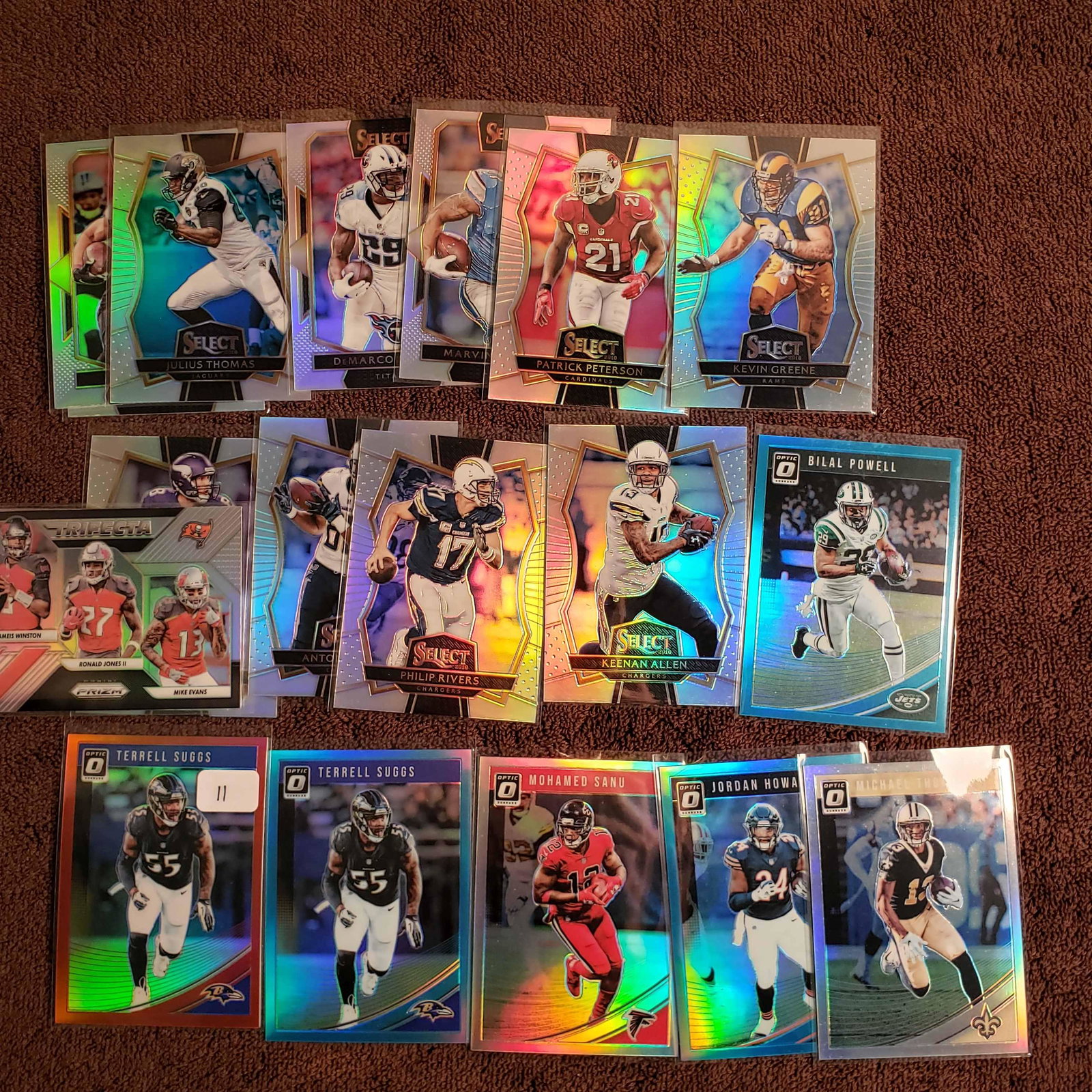 LOT OF 20 PANINI PRIZM/OPTIC FOOTBALL SILVER PRIZM: TERRELL SUGGS RED 18/99 AQUA BLUE 018/299, MICHAEL THOMAS SILVER, MOHAMED SANU AQUA BLUE 077/299, 2016 KEENAN ALLEN, PHILLIP RIVERS, ANTONIO GATES, KEVEN GREENE SILVER PRIZMS