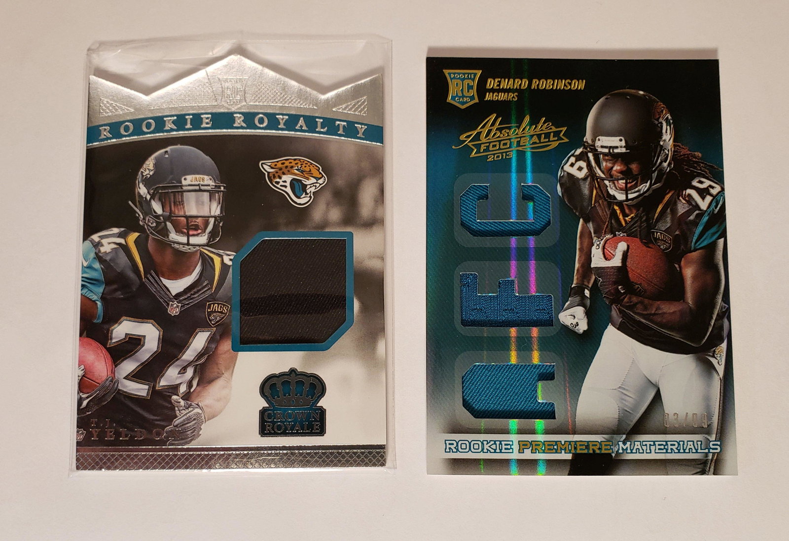 JACKSONVILLE JAGUARS NUMBERED ROOKIE JERSEY RELIC CARDS: TJ YELDON ROOKIE ROYALTY 326/499, DENARD ROBINSON 03/99