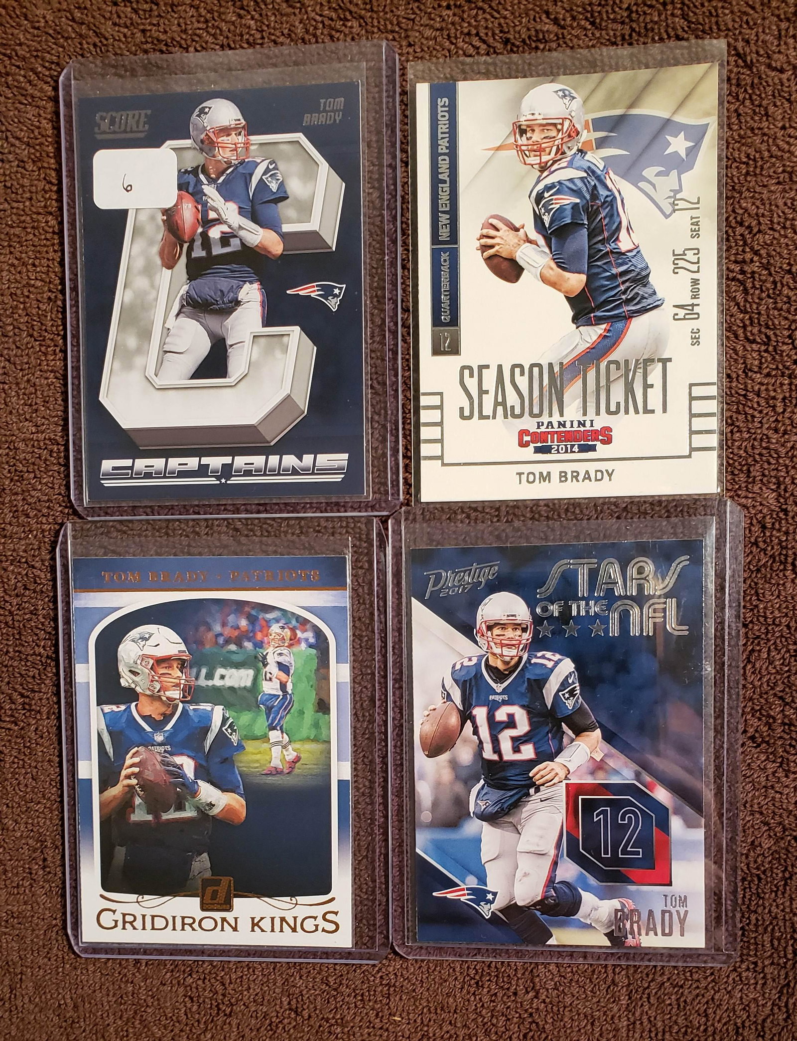 LOT OF 4 TOM BRADY CARDS #TB12 OFF TO TAMPA BAY!: 2019 GRIDIRON KINGS, 2018 CAPTAINS INSERT CARD, STARS OF THE NFL INSERT CARD, 2014 CONTENDERS SEASON TICKET