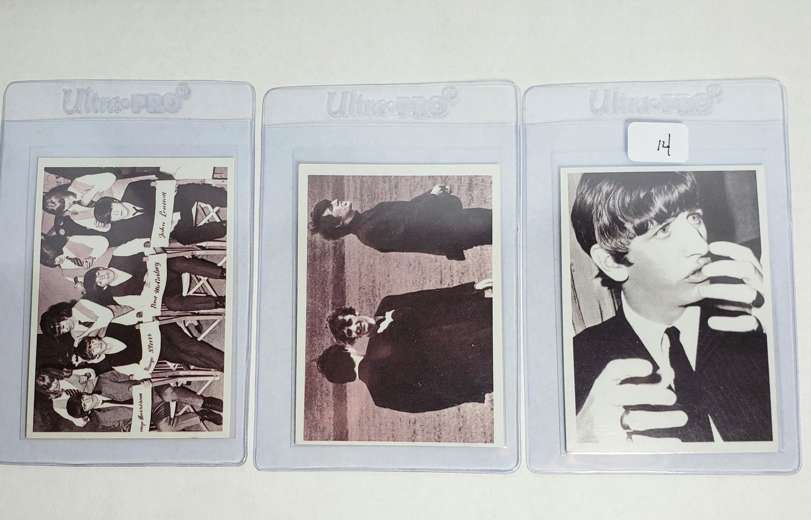 ORIGINAL 1964 BEATLES MOVIE SERIES TRADING CARDS: 1964 TOPPS BEATLES MOVIE-A HARD DAY'S NIGHT CARDS NICE NEAR MINT LOT FEATURING JOHN LENNON, PAUL McCARTNEY, GEORGE HARRISON AND RINGO STARR. THIS LOT IS FROM ORIGINAL OWNER WHO OPENED AND STORED FOR Y