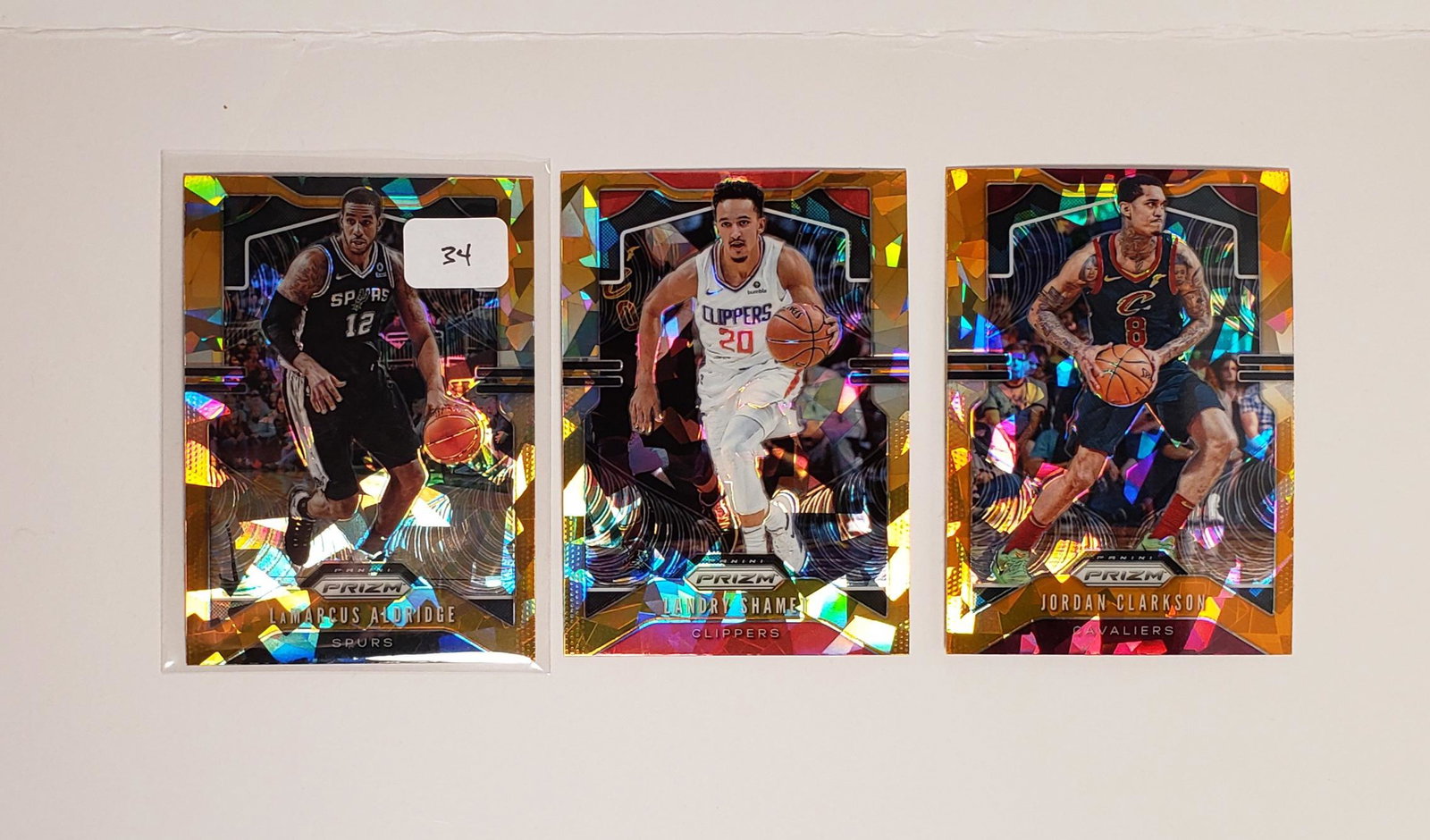 2020 PRIZM BASKETBALL ORANGE CRACKED ICE PRIZM SPS: LAMARCUS ALDRIDGE SPURS, JORDAN CLARKSON, LANDRY SHAMET