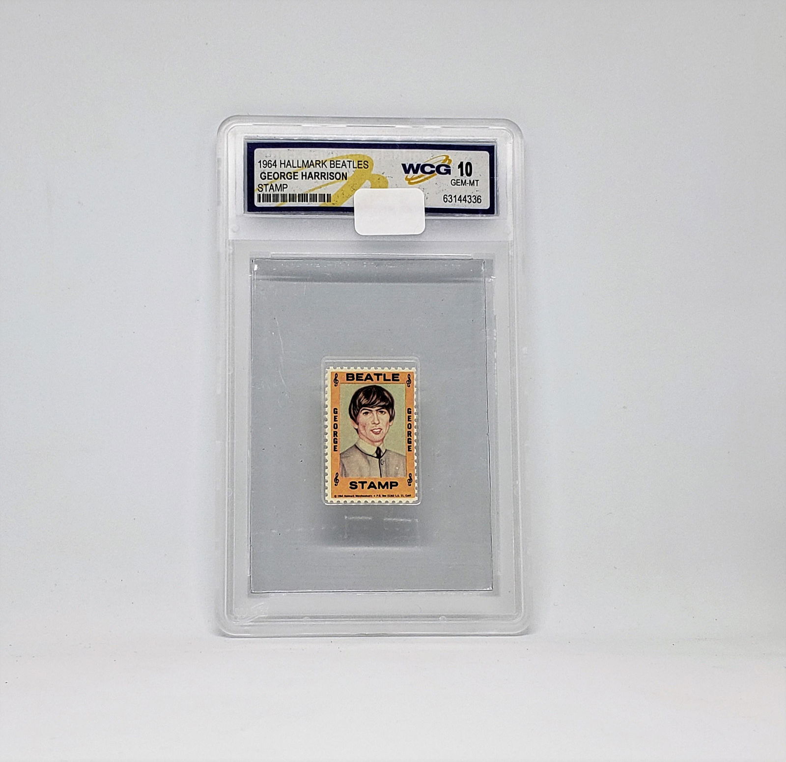 GEM MINT 10 BEATLES GEORGE HARRISON 1964 HALLMARK STAMP: GEORGE HARRISON SLABBED BEATLES STAMP FROM THE 1964 HALLMARK STORES RELEASE