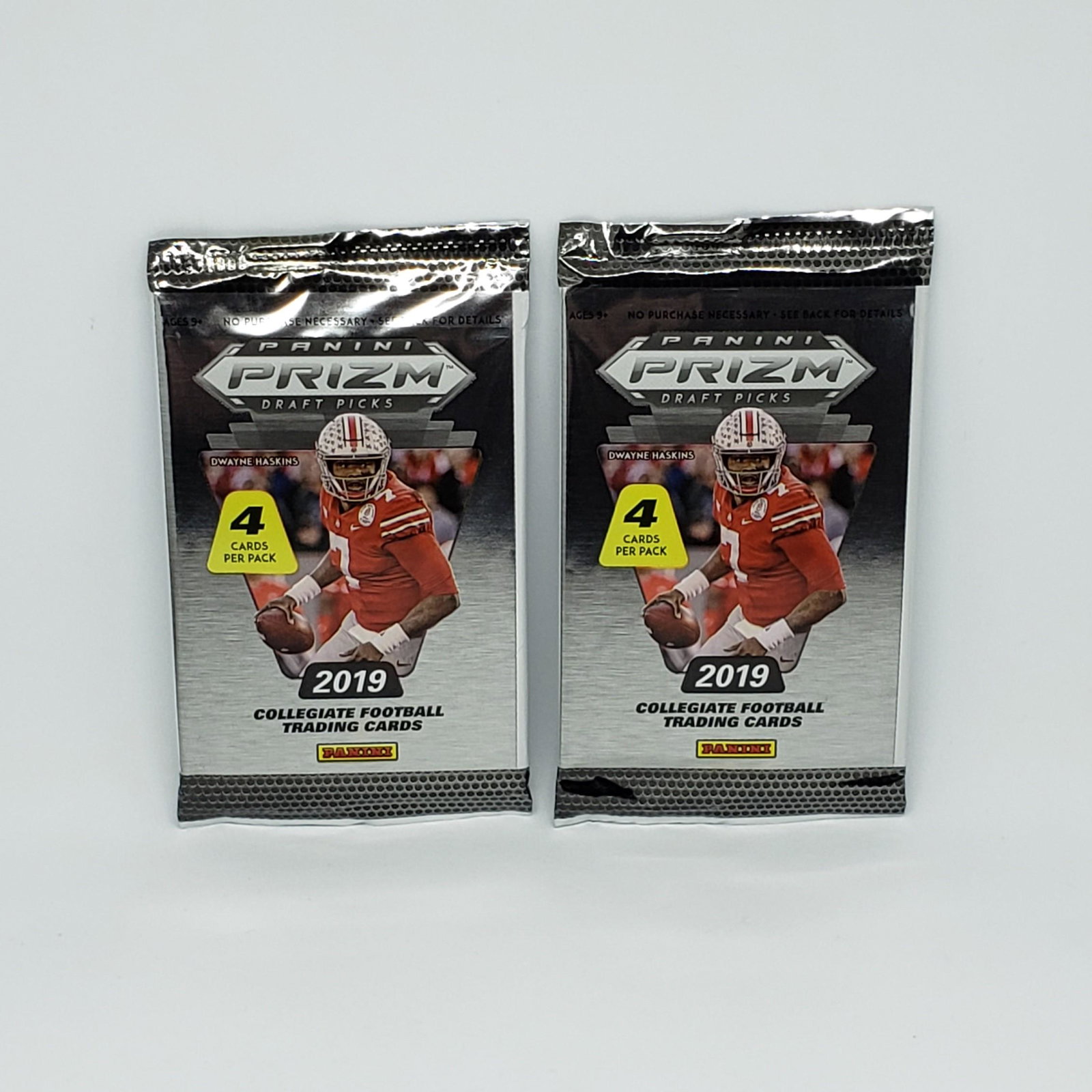 TWO SEALED PACKS OF 2019 PANINI PRIZM DP FOOTBALL CARDS: 2019 Panini Prizm Draft Picks Football KYLER MURRAY, DANIEL JONES ROOKIES