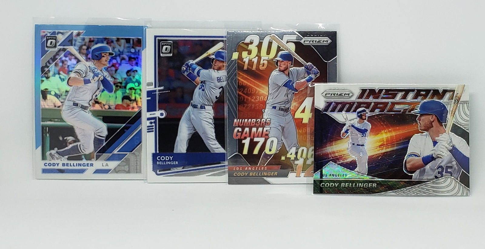 LOT OF 4 CODY BELLINGER PANINI OPTIC INSERT AND HOLOS (1 of 1)