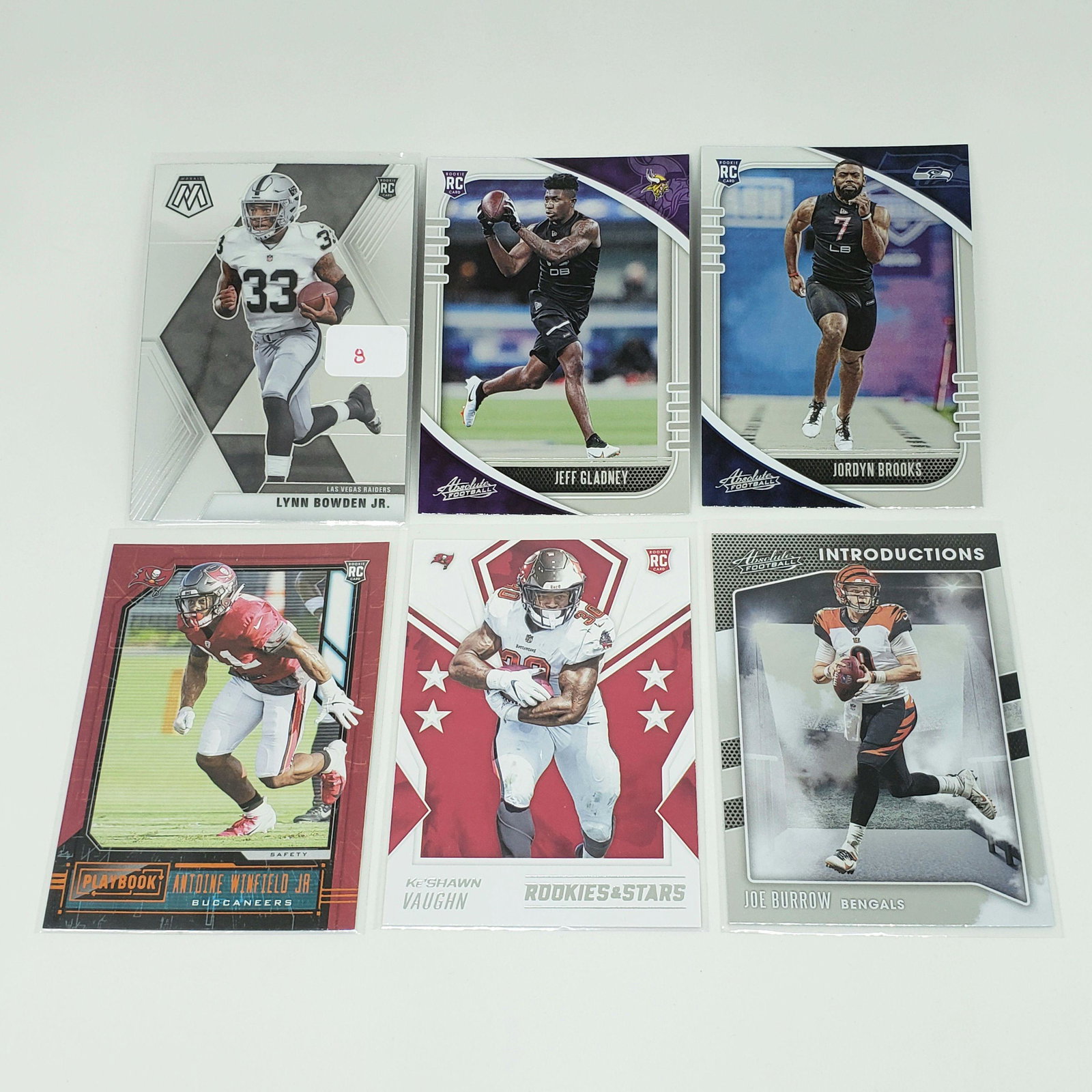 LOT OF 6 ROOKIE FOOTBALL CARDS WITH JOE BURROW (1 of 1)