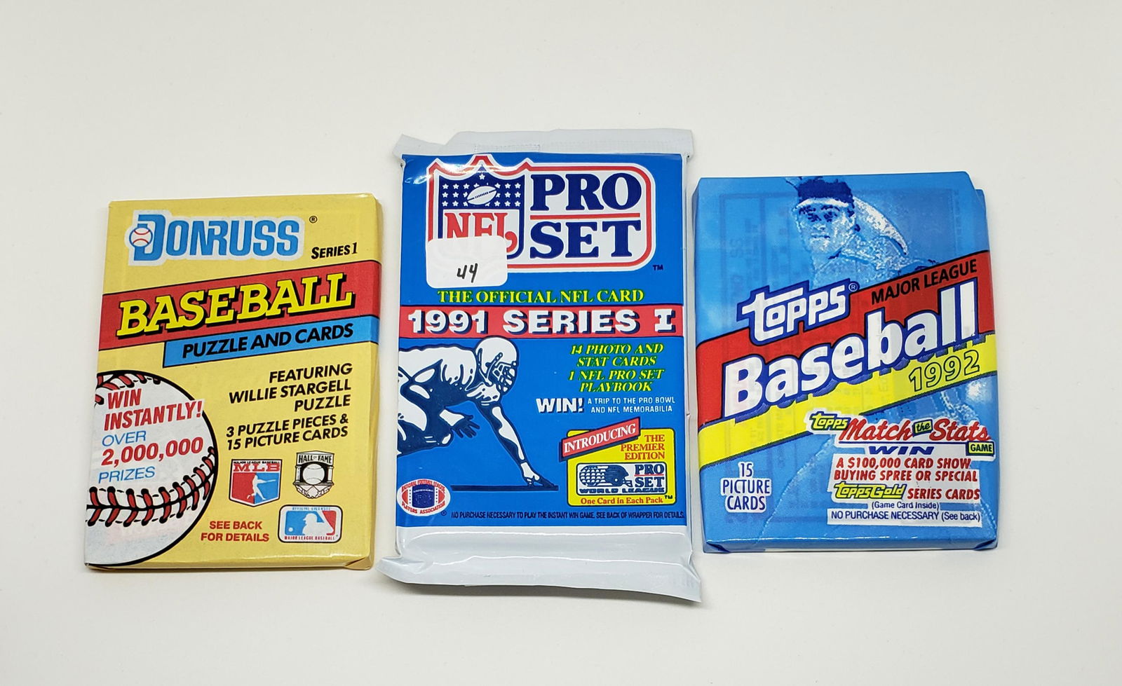 LOT OF 3 ASSORTED BASEBALL/FOOTBALL SEALED PACKS (1 of 1)