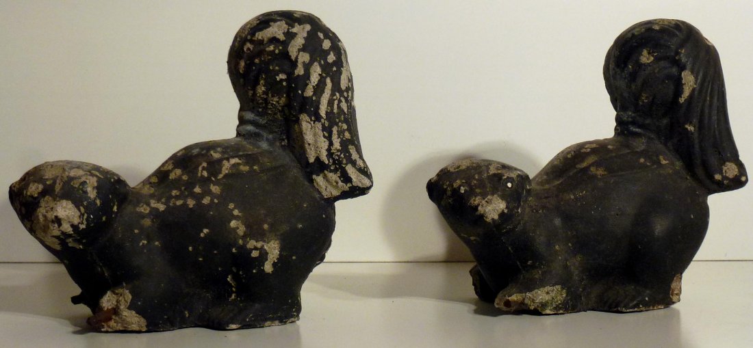 Pair of concrete skunk yard ornaments. (1 of 3)