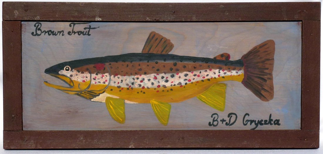 Painting of a brown trout set into a wooden frame: This is a painting of a brown trout set into a wooden frame. It is titled "brown trout" and signed B & D Gryczka. This piece was probably made in the late 1900s. It is in excellent condition, and a ve