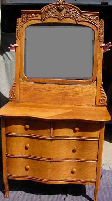 1920'S CURVED TIGER OAK DRESSER WITH MIRROR & CLA