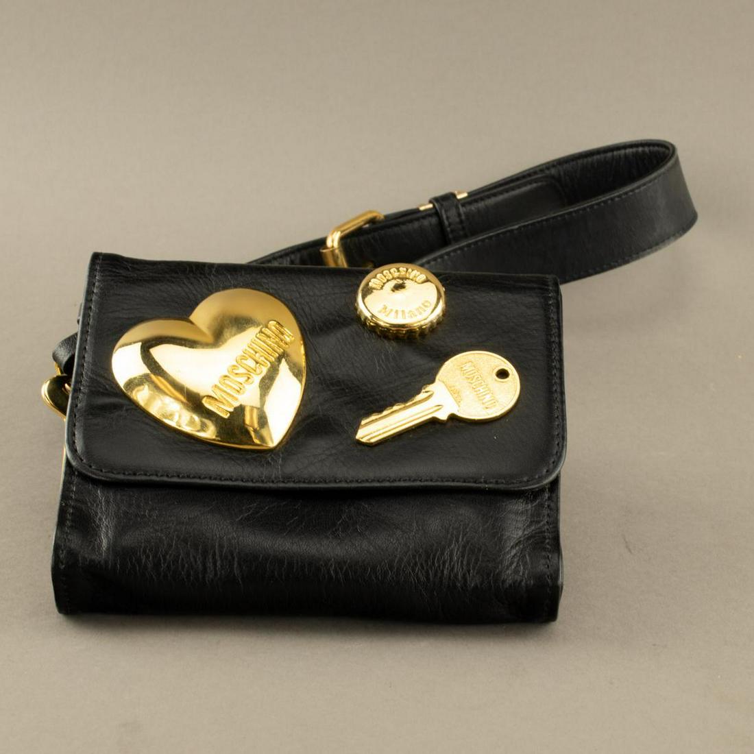 Moschino Leather Belt Bum Bag: Moschino Leather Belt Bum Bag Measurements: 5.75 in. (14.5 cm.) L x 1 in. (2.5 cm) W x 5 in. (12.5 cm.) H http://www.karburys.com/lotdetail/969