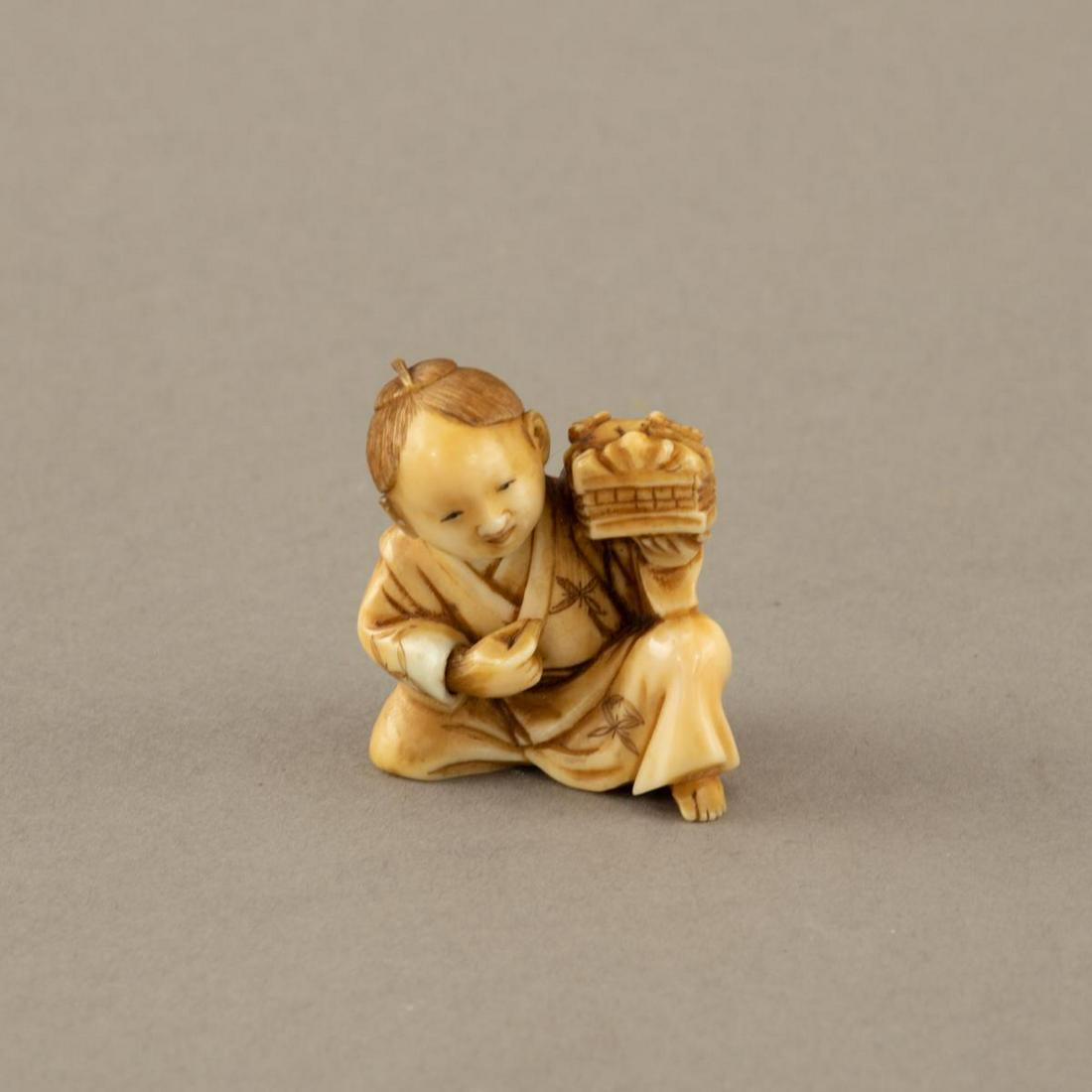 Very fine & old carving of a well dressed child (1 of 3)