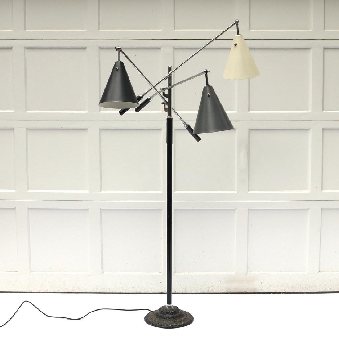 GINO SARFATTI TRIENNALE FLOOR LAMP: chrome frame with black and grey shades; height of main post 55 in., length of arms 33 in. Condition: [damage to chrome frame, damage to screw mounting of articulating arms, base not original]