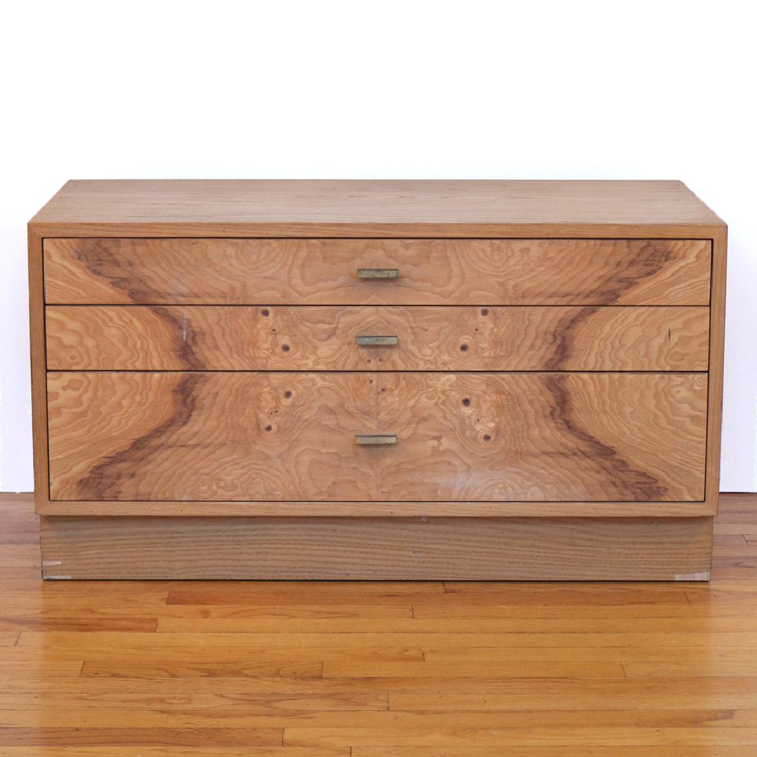 HARVEY PROBBER OAK SIDE CHEST: with three drawers fronted with figured walnut veneer, 20 x 36 x 18 in. Provenance: The Estate of the late Milton Gelfand, Pound Ridge, N.Y. Condition: [veneer loss along base on left side and at fron