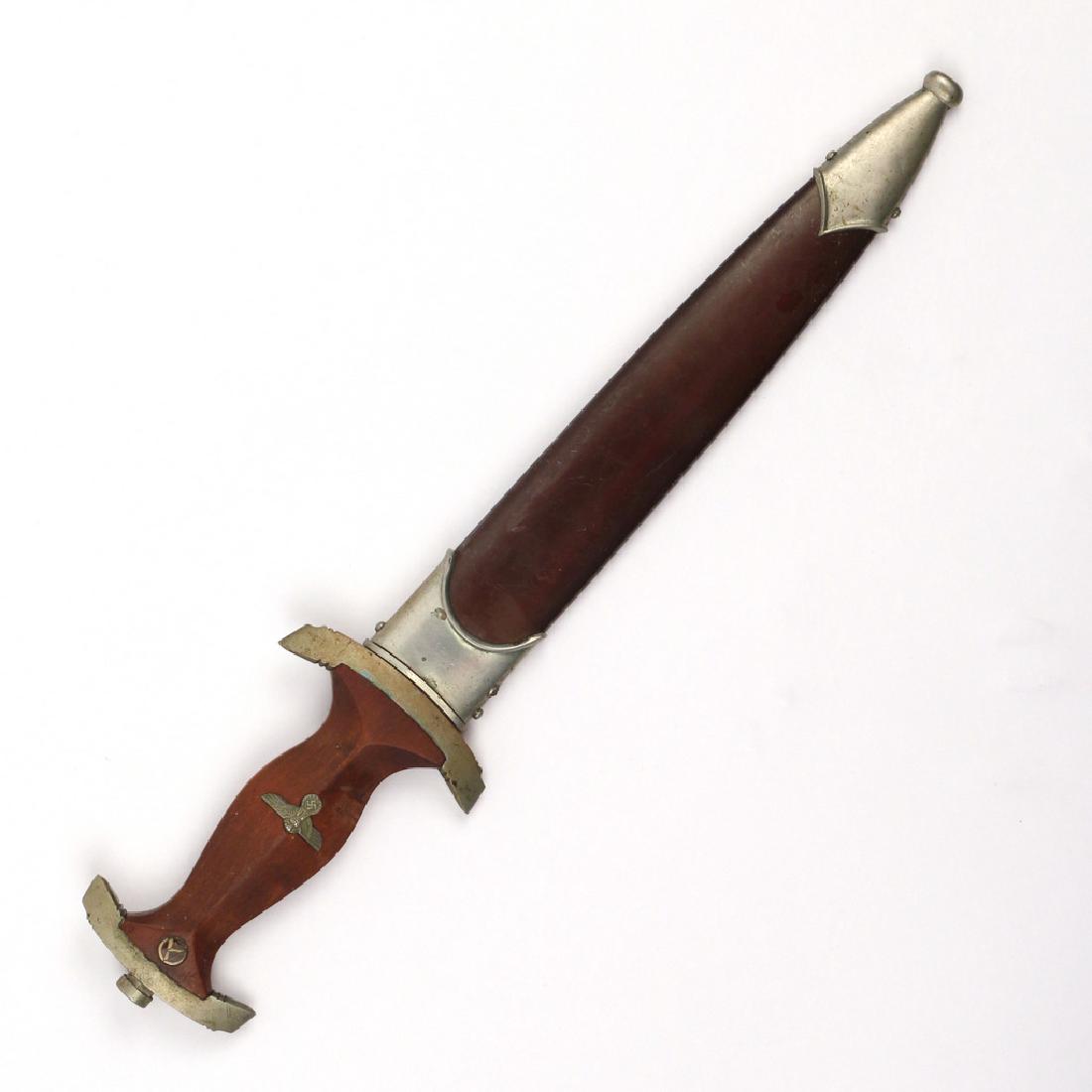 NAZI S.A. DAGGER: Having an 8-1/2 in. blade inscribed ALLES FUR DEUTSCHLAND", stamped "OTTO SIMON - STEINBACH Kr. M.", hilt impressed "Fr" overall dimensions: l. 14-3/4 in. Condition: scabbard missing ring mount, paint