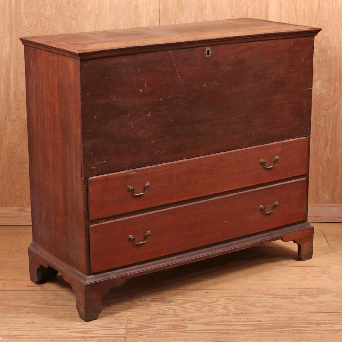 AMERICAN PINE AND MAPLE MULE CHEST: 19th Century, in brown stain, lift top with two lower drawers and bracket feet, h. 39 w. 43-1/2 d. 18 in.