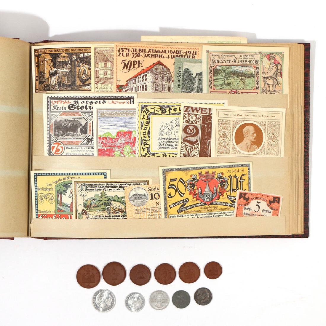 COLLECTION OF GERMAN NOTGELD: in a bound album labeled '1914-1924', containing 40 pages all loaded with various bank notes; plus a box with 6 earthenware coins and 5 misc. German coins