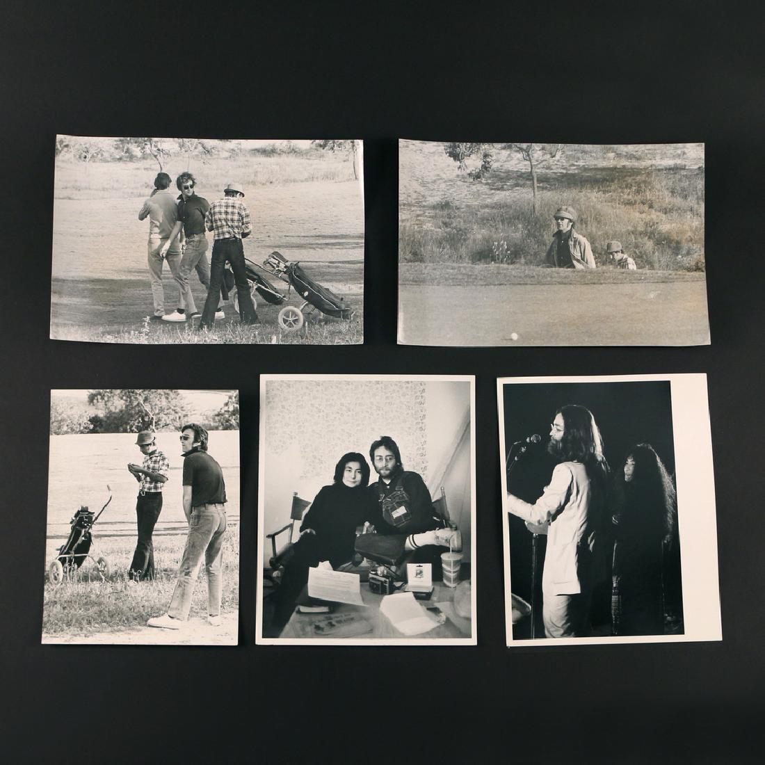 (5pc) RARE PHOTOGRAPHS OF JOHN LENNON & YOKO: ONO, c. 1970s, apparently unpublished, including a photo of the two seated in director's chairs, 10 x 8 in.; a concert photo of the duo from over John's left shoulder, 9-1/2 x 6-1/2 in. (subject); and