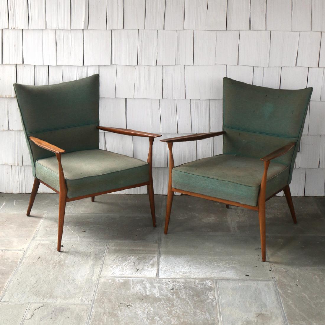 (2pc) PAUL MCCOBB LOUNGE CHAIRS: c. 1950s, walnut with grey upholstery h. 34-1/2 w. 27 d. 32 in. Condition: faded and partially dried upholstery, a few bumps and scratches