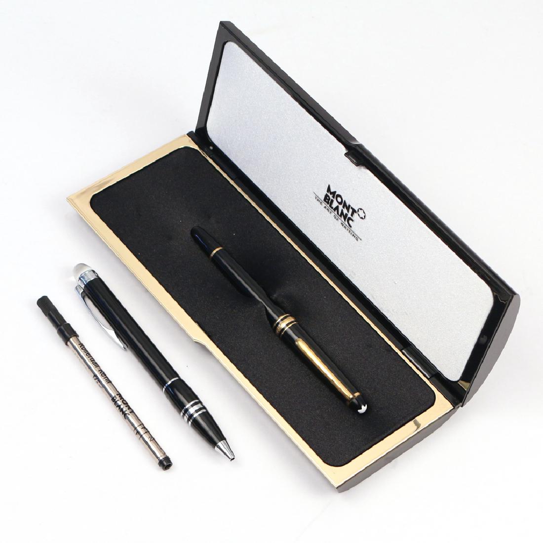 (2pc) MONTBLANC PENS: Including one starwalker" trimmed in silver, and on Meisterstuck trimmed in gold, one case plus pen refill"