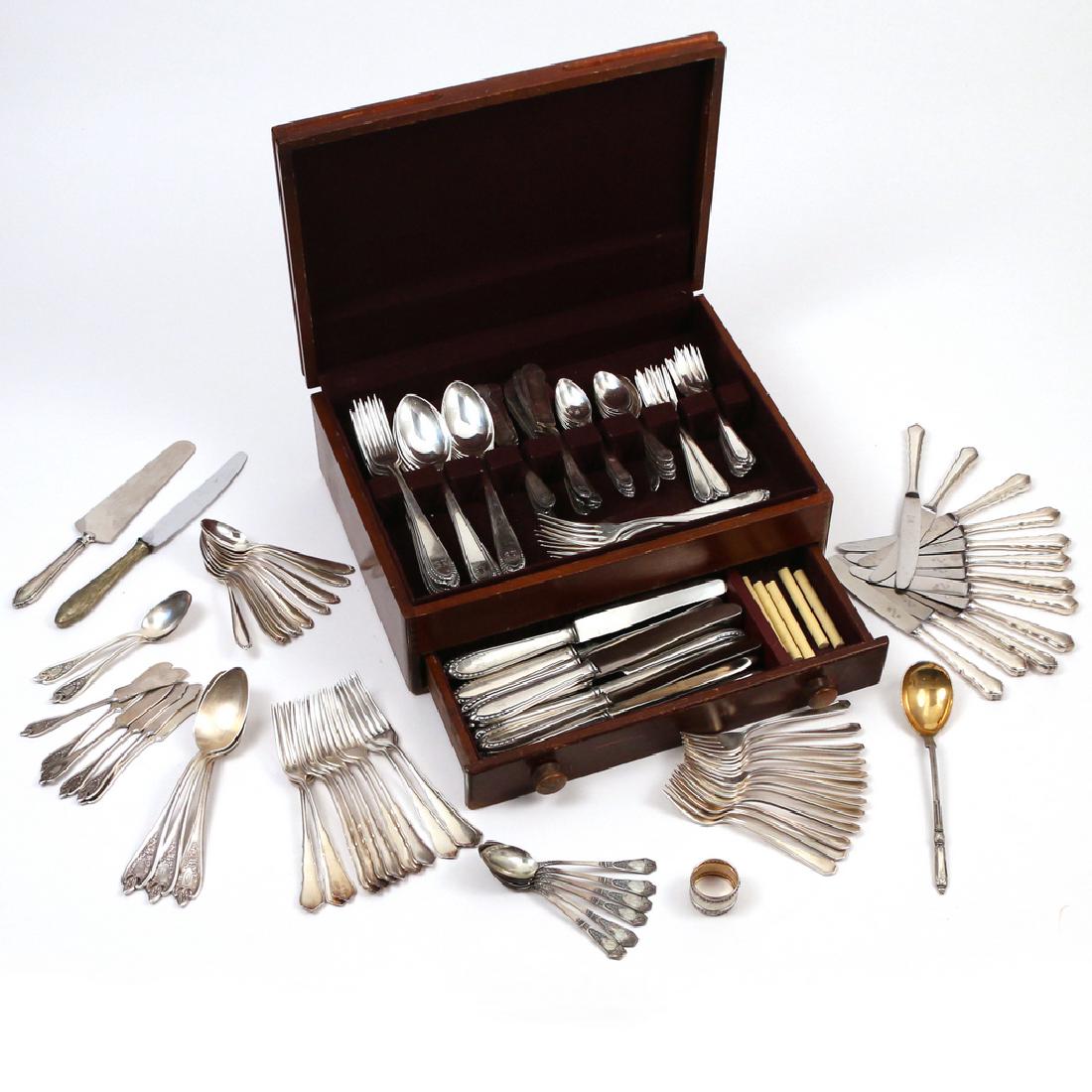 BRUCKMANN & SOHNE SILVERPLATE FLATWARE SERVICE: Including 12 dinner forks, 12 dinner knives, 12 tablespoons, 12 teaspoons, 12 butter knives, and 12 dessert forks monogrammed B.K."; plus other various pieces of silverplate including Rogers, German, 