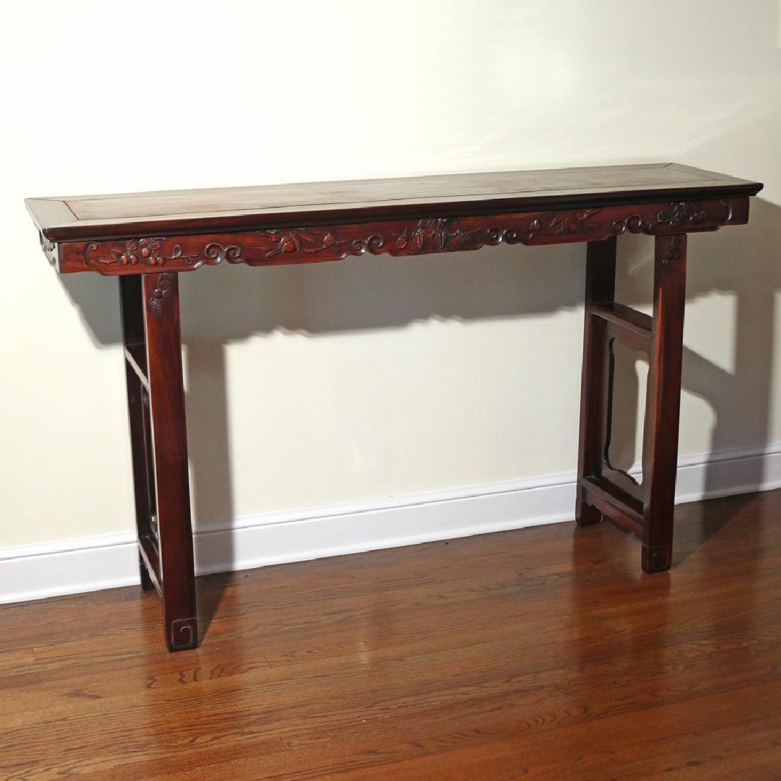 CHINESE CARVED HONGMU ALTAR TABLE: late 19th Century, with recessed legs and carved apron h. 41 w. 71-1/2 d. 17 in.