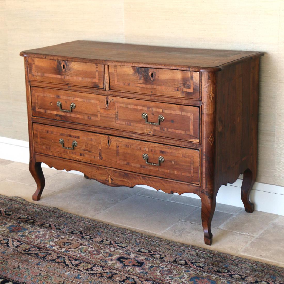 CONTINENTAL INLAID WALNUT COMMODE: early 19th Century, having two short over two long drawers h. 33 w. 46-1/2 d. 21-1/2 in. Condition: replaced pulls, stripped finish, repaired feet, replaced backboards