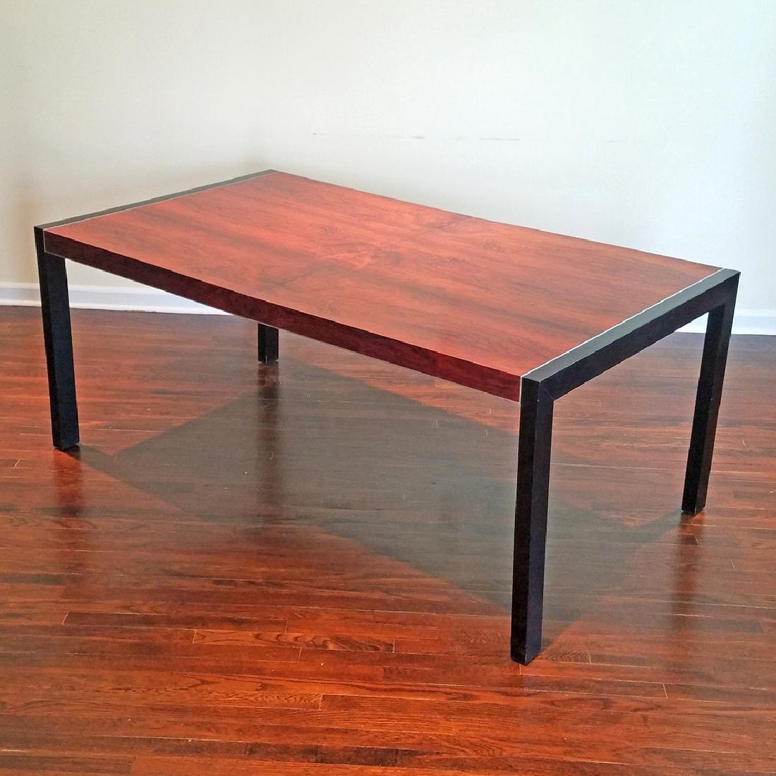 JOHN STUART ROSEWOOD EXTENSION DINING TABLE: circa 1960s, in the style of Milo Baughman, rosewood veneer, chrome, and black lacquer, with two matched 20-inch leaves, John Stuart Inc. label h. 28-1/2 w. 68-1/2 d. 40 in. Condition: leaves of a red