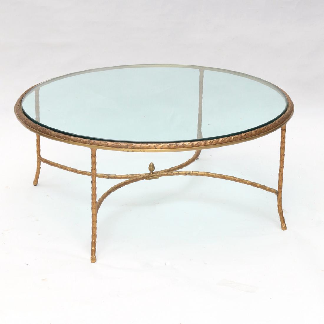 GILT ORMOLU ROUND LOW TABLE: with conforming glass top h. 17 w. 40 in.
