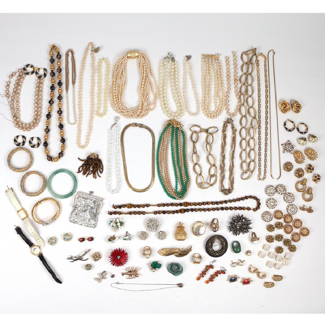 MISC. LOT OF COSTUME JEWELRY: consisting of several strands of pearls and other beads, pins, bracelets, etc., all pieces unmarked