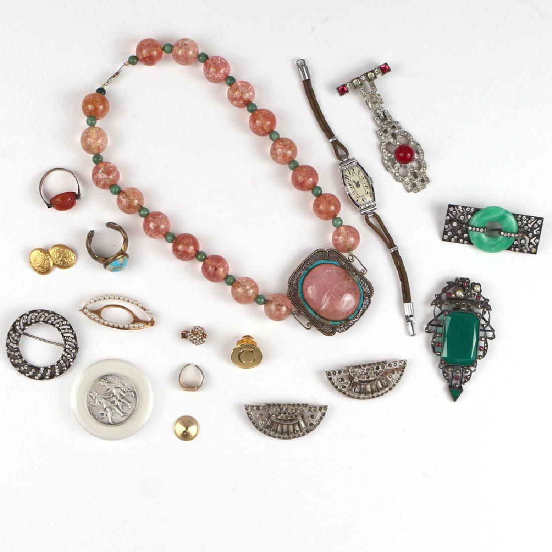 MISC. JEWELRY & COSTUME JEWELRY: Including a pin with seed pearls, a pair 14k gold cufflinks, a rose quartz necklace, 6 rhinestone pins, 3 rings, 4 metal findings, an Edwardian wristwatch with platinum case and small stones, and a Ch