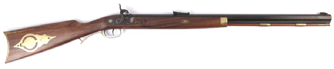 CABELA'S HAWKEN STYLE BLACK POWDER RIFLE: 50 cal., having a 29 in. blued octagonal barrel with Cabela's inc., Sydney NE" engraved, walnut stock with patch box, l.o.p. 14 in. (to front trigger), manufactured by Investarm, Iitalys/n A1527657"