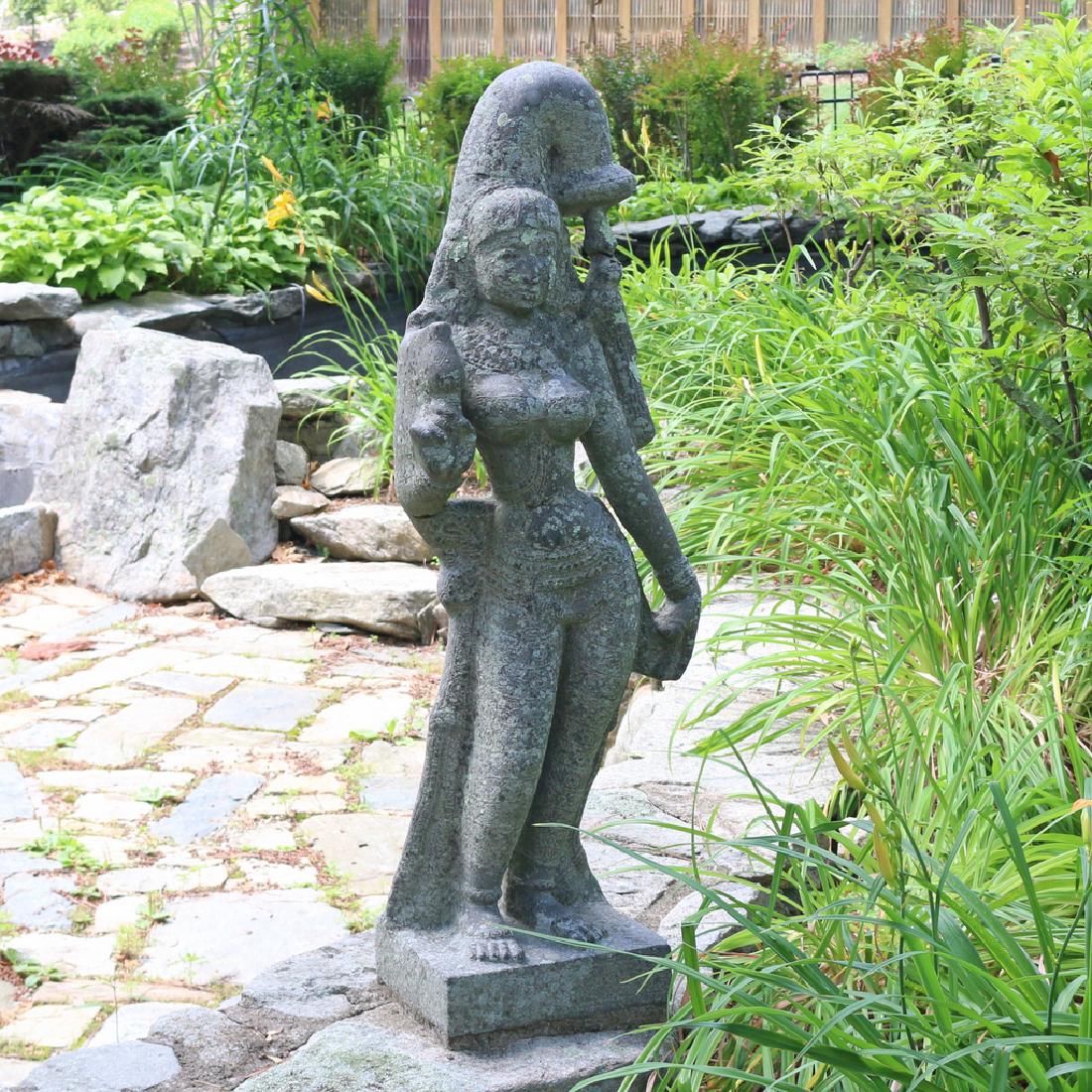 19TH c. SOUTHEAST ASIAN STONE SCULPTURE OF GUANYIN: holding a ewer, appx. 48 in. high; AUCTION IN SITU ITEM: Please note this is available to view by appointment as it is stored externally to the saleroom Provenance: The Estate of the late Milton Gelfa