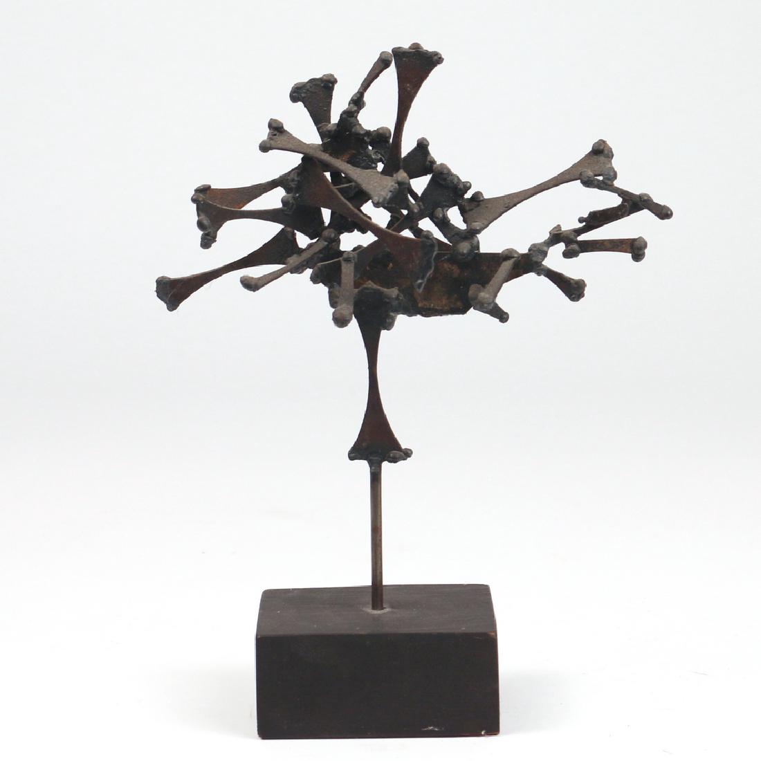 JOHN RISLEY SCULPTURE: Symbol IV title and artist's name on label on bottom Metal h. 10-3/4 w. 8-1/4 d. 3 in.