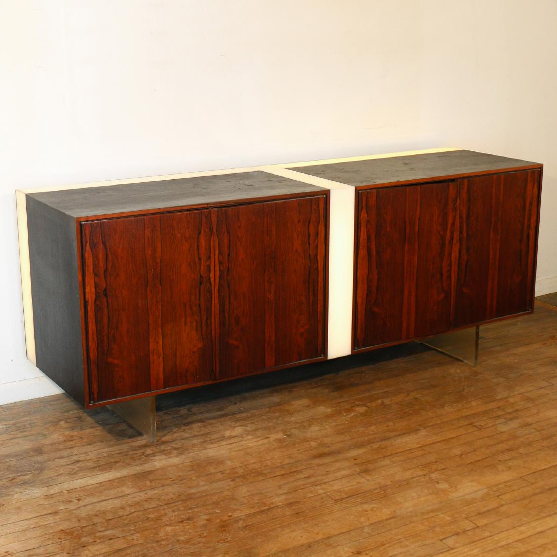 RARE VLADIMIR KAGAN ILLUMINATED CABINET [UPDATED]: circa 1965, rosewood, acrylic, and lucite, with two pairs of cabinet doors on lucite legs Except for the base, this cabinet appears to be identical to one sold at Wright, Chicago, IL, on April 25, 201