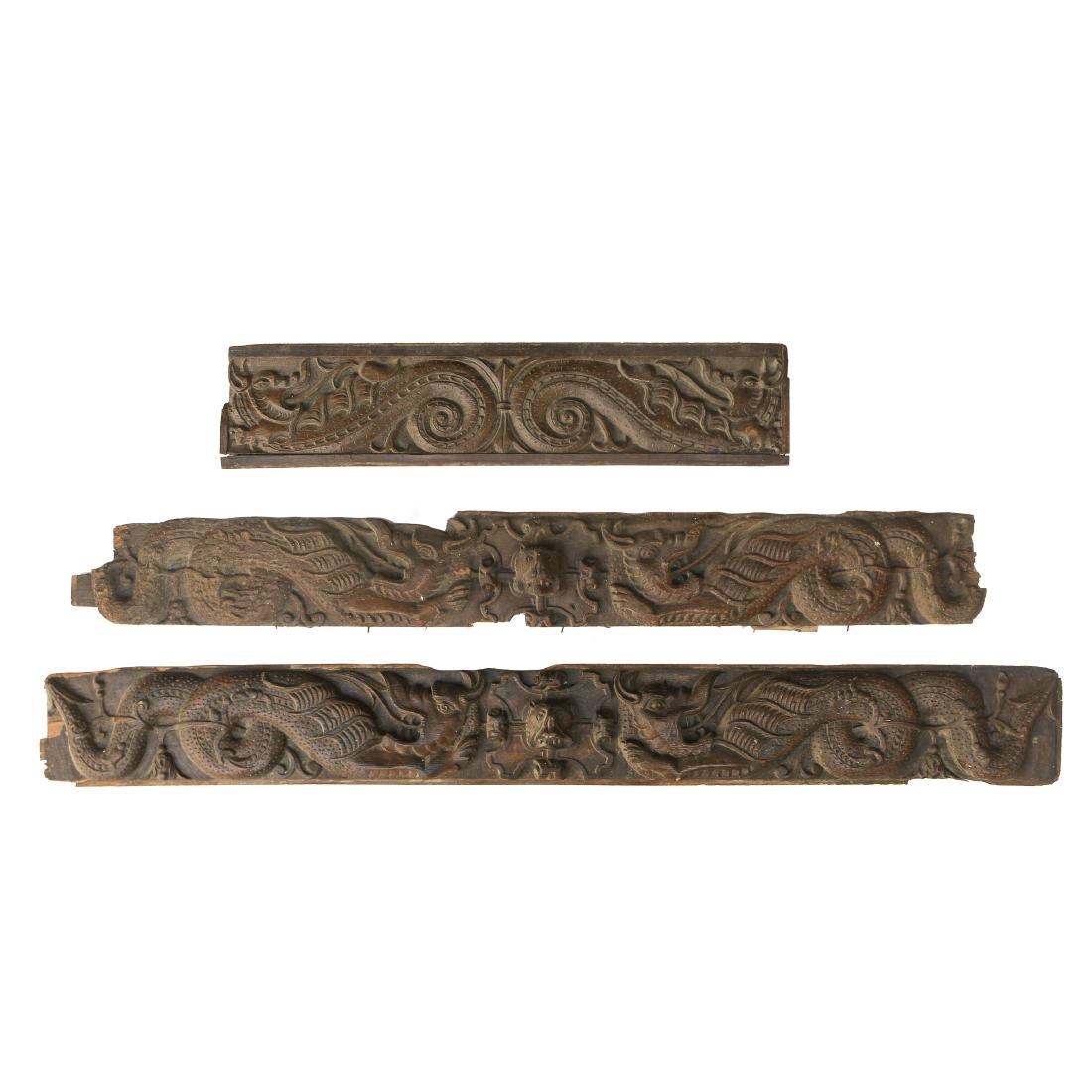 (3pc) RENAISSANCE REVIVAL CARVED MOLDINGS: 19th Century, oak carved in high relief with dragons and animal masks, consisting of two long pieces (one broken in two) Provenance: Sothebys overall: 64 x 7-3/4; 57 x 7; and 35 x 7-1/2 in.