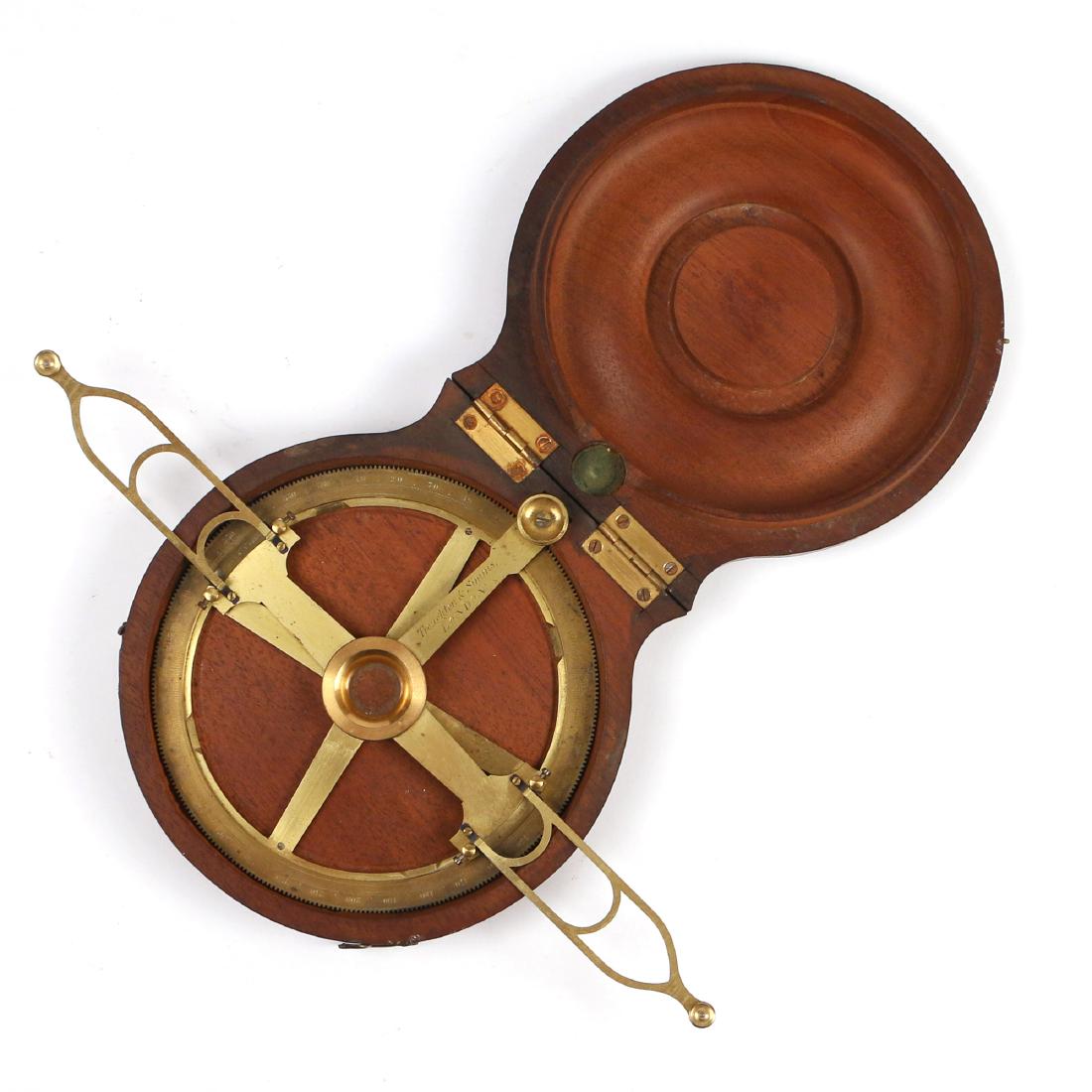 LACQUERED BRASS INDEX PROTRACTOR: by Troughton & Simms, London, circa 1840, with fitted wood case, the adelade with two hinged index arms and signed â€˜Troughton & Simms / Londonâ€™, within calibrated ring with rack adjustmen