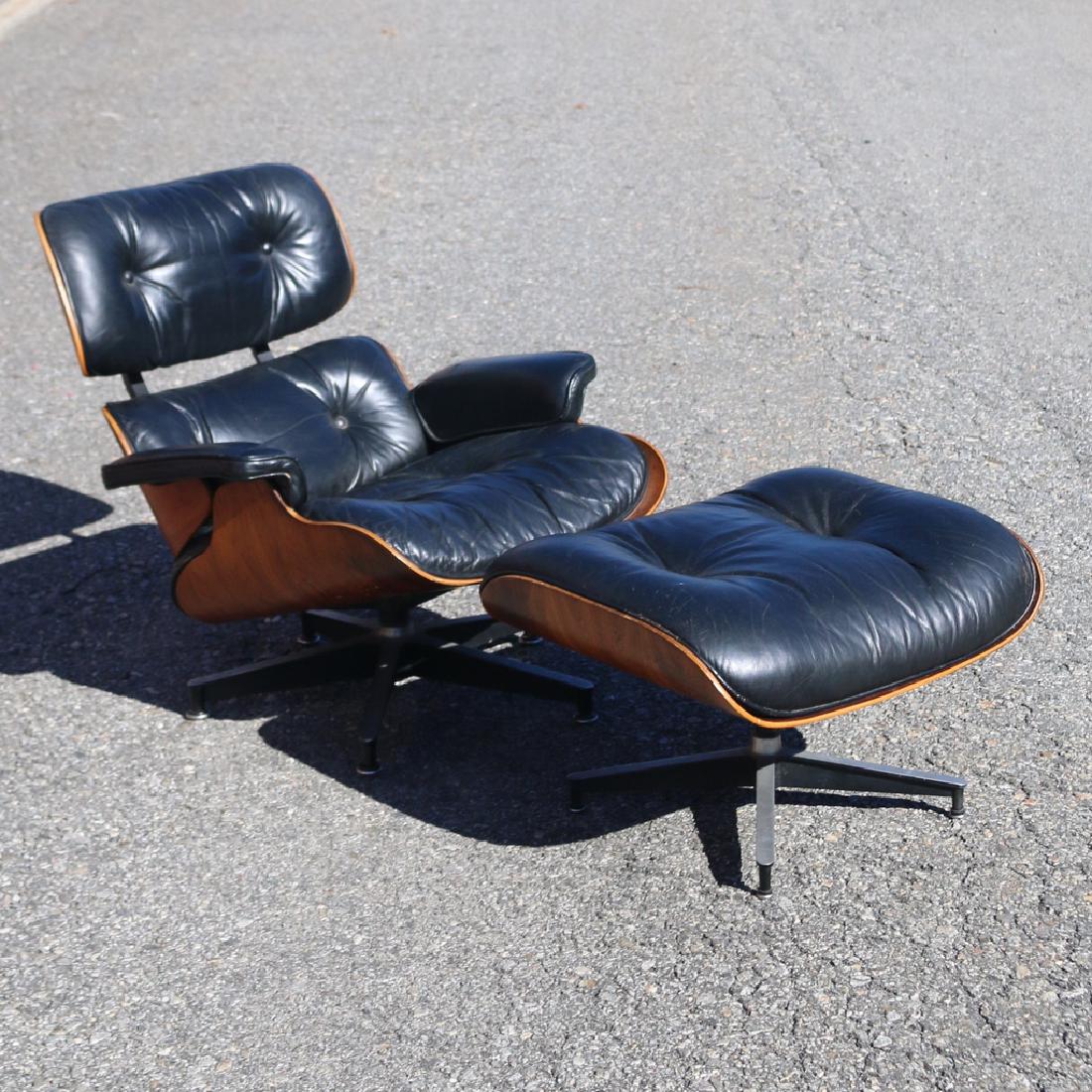 CHARLES & RAY EAMES LOUNGE CHAIR & OTTOMAN: Blk. leather, with original foil tag Provenance: Scarsdale estate
