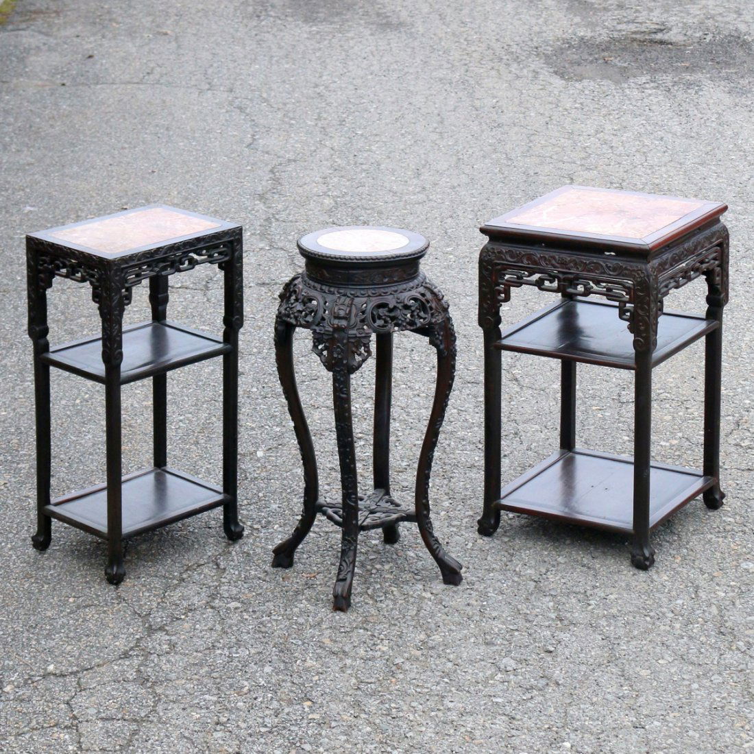 (3pc) MISC. CHINESE EXPORT HARDWOOD STANDS: with soapstone tops, including two of rectangular shape with lower shelves, and a round tabouret with four shaped legs h. 32 w. 18 d. 18 in. (largest)