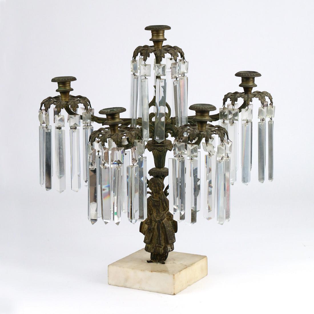 FRENCH ORMOLU GIRANDOLE CANDELABRA: early 20th Century, five-light, with cut glass drops and a figure of a peasant woman standing on a marble base h. 20-1/2 w. 18 in.
