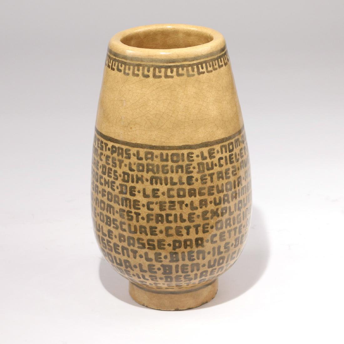 HENRI SIMMEN (Flemish, 1880-1963) VASE: Designed as a ovoid vase, beige ground with French writing crackle glaze h. 9 Provenance: Estate of the late Mimi Kayden, Stamford, CT.