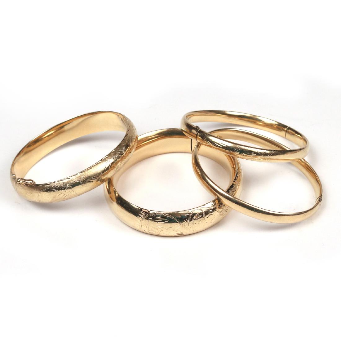 (4pc) GOLD BANGLE BRACELETS (1 of 1)