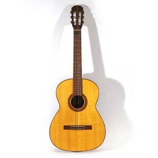 GIANNINI MODEL GN80 ACOUSTIC GUITAR: Made in Brazil, nylon string with rosewood fingerboard and parquetry inlay, finely made with exotic woods throughout, serial no. I-531, label of Tranquillo Giannini S. A., with case h. 39 in.