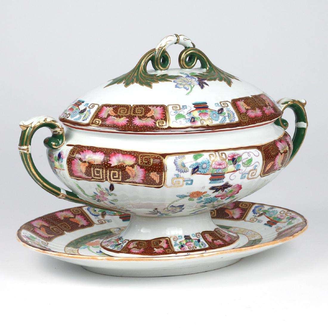 ASHWORTH BEAL IRONSTONE TUREEN & UNDERPLATE: late 19th/early 20th Century, the covered tureen and underplate with Chinese floral designs on a white ground with brown trim, gilt highlights h. 10 in. (tureen) w. 14-3/4 in. (underplate) [IN SITU] T