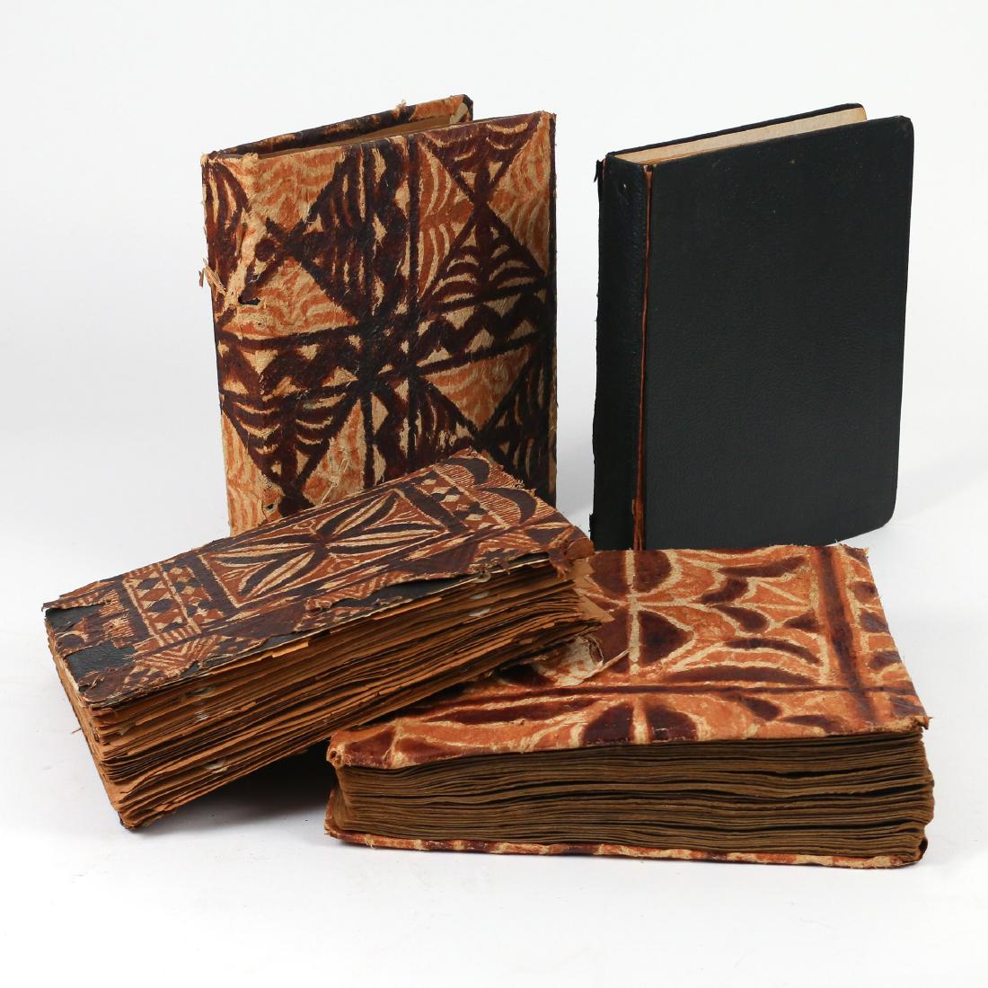 1920'S ORIGINAL MOVIETONE SCRAPBOOK: Assembled by Newsreel cameraman Charles Peeden, covered in Fijian Tapa Cloth, the scrapbook contains over 100 illustrated pages with photos, drawings, and ephemera of momentous events of his days arou