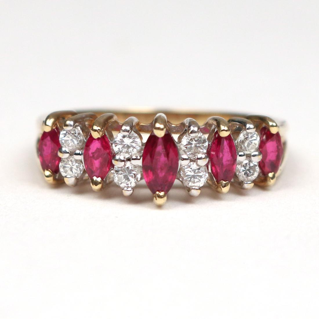 RUBY, DIAMOND, & GOLD RING: Designed as five marquise cut rubies separated by four pairs of small round brilliant diamonds in a 14k gold setting; ring size 6.25, total weight 3.3g Provenance: From the Estate of Sue Jean Wong, Da