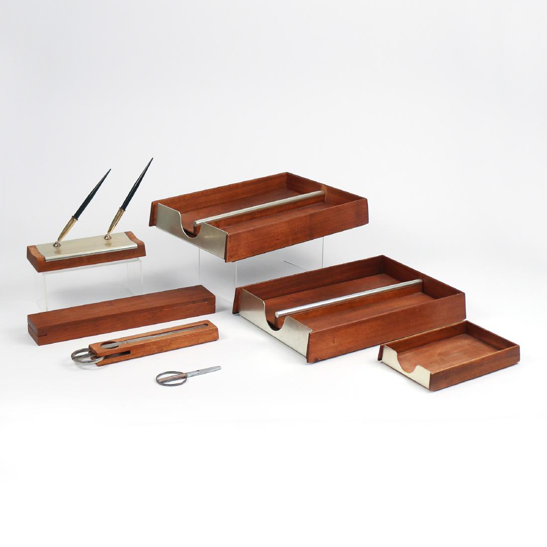 (7pc) TEAK & STAINLESS STEEL DESK SET: with Mark Cross label, including two document boxes with weighted tops (h.2-1/4 x 15-1/2 x 10-1/2 in.), an open letter box, a teakwood sheath with letter opener and scissors, and a long box with inter