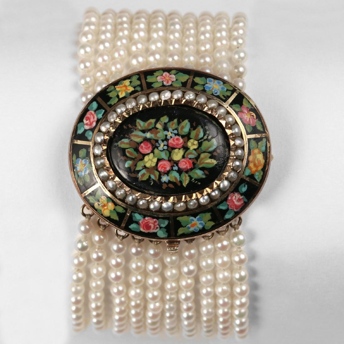 19TH C. PEARL & ENAMEL BRACELET: Designed as a central black enameled oval with flowers and leaves surrounded by a line of seed pearls and a border of different enameled flowers in reserves, suspending ten strands of small pearls, ba