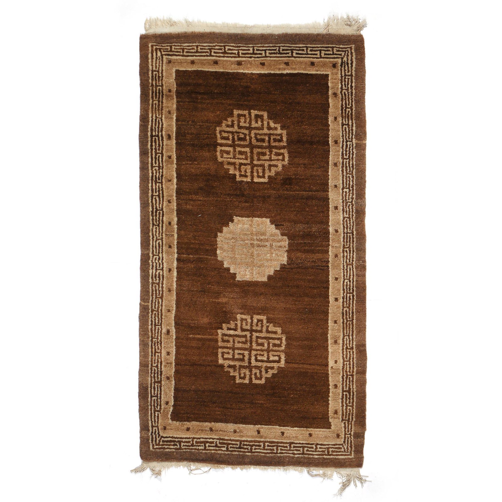 MONGOLIAN RUG: Mid-20th C. or earlier, having three medallions within open field, muted brown to beige colors h. 66 w. 33 in.