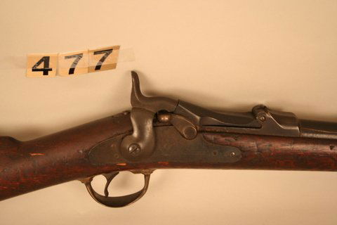 477) U.S. SPRINGFIELD MODEL 1873 Trap-Door Saddle Ring: 477) U.S. SPRINGFIELD MODEL 1873 TRAP-DOOR SADDLE RING CARBINE, 45-70 CAL., ORIGINAL BLUING 75%, BARREL L. 22" Marked "US SPRINGFIELD" ALSO "VP" AN EAGLE HEAD AND "P". Serial # 368182 REAR SIGHT MARKE